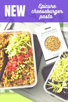 two containers of food are sitting on a table