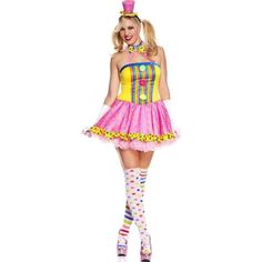 a woman in a clown costume is posing for the camera with her hands on her hips