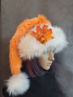 SIZING  Long hats fit 22 to 24 inch heads, short fit average 22 to 23 inches and the LRG is a short hat that fits up to 24 inch heads.    These are a great hat for the beginning of the season in some gorgeous fall colors! The hat is a beautiful tangerine/creamsicle color. The fur has hi and low areas and is a nice thick fur. The brims are a blonde husky faux fur. A creamy white with faint blonde tips. These brims are cut generously so they can be cuffed down. Cuff the brim and then rough the fur Fitted Fall Cap, Adjustable Orange Cap, Winter Orange Hat, One Size Fits Most, Orange Adjustable Hat With Curved Brim, Winter Orange Hat, Adjustable Orange Hat With Curved Brim, Fall Brimmed Mini Hats, Fall Brimmed Mini Hats One Size, Brimmed Mini Hats For Fall