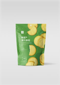 a bag of potato chips on a white surface with chinese writing in the middle,