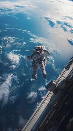 an astronaut is floating in the water near some clouds and blue sky, while looking down at earth