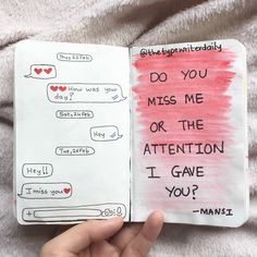 someone is holding an open notebook with some writing on it and the words do you miss me or the attention i gave you?