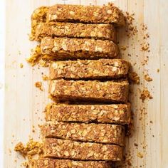 sliced oatmeal bars sitting on top of a cutting board