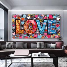 a living room filled with lots of furniture and walls covered in graffiti art on the wall