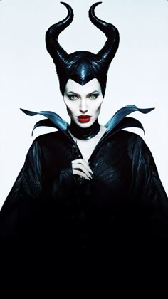 maleficent from maleficent 2 is shown in black with horns on his head