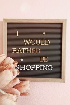 a sign that says i would rather rather be shopping