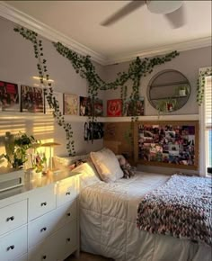 a bedroom with plants growing on the wall