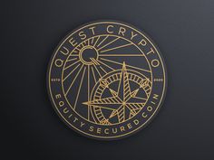 the quest crypt logo is shown on a black surface with gold foil lettering and an image of a compass