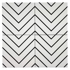 black and white chevroned tiles with lines on them