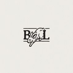 a black and white logo with the letter b l