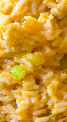 closeup of macaroni and cheese with peas