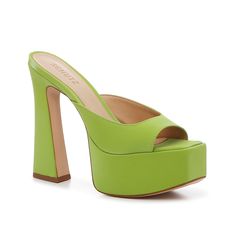 Schutz-Andrina Platform Sandal Elevate a night out look with the Andrina sandal from Schutz. This sharp, disco diva-inspired pair sports a chunky platform and heel that take your style to new heights. Bold Heels For Spring Party, Bold Spring Party Heels, Green Synthetic Platform Heels, Modern Green Heels With Heel Loop, Bold Heels For Night Out In Summer, Platform Sandals For Night Out, Green Chunky Platform Heels For Spring, Bold High Heel Synthetic Sandals, Spring Fitted Platform Sandals