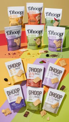 six bags of choop crackers sitting on top of a colorful table with chips in them