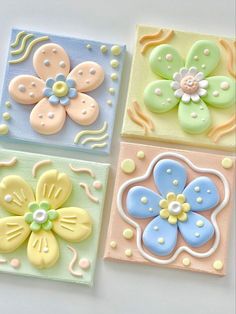 three different types of decorated cookies on a table