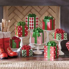 an image of christmas presents displayed on a shelf with the caption'designer presents '