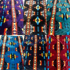 four ties are laid out on the floor in front of each other, all different colors and patterns