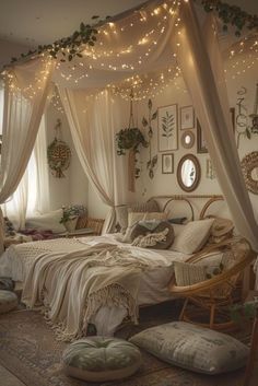 a bedroom decorated in white with lots of lights