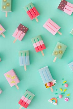 colorful popsicles and candies on a blue background