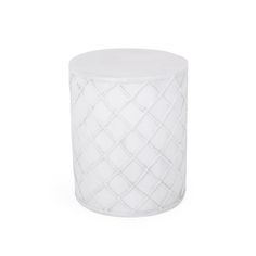 a white round stool with diamond pattern on the top and bottom, in front of a white background