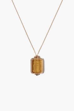 Wear your star sign with this elegant whiskey quartz pendant featuring an engraved gemini intaglio and .03ct diamond inlay on a 14k gold chain. 14k yellow gold. Chain Length: 17" - 19" adjustable, Pendant: 14x18mm Handmade in Vietnam. Gold Intaglio Necklace, Gemini Necklace, Ideal Closet, Zodiac Necklace, Gemini Zodiac, Zodiac Necklaces, Yellow Gold Chain, Star Sign, Quartz Pendant