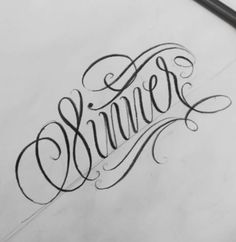 the word summer written in cursive writing on paper