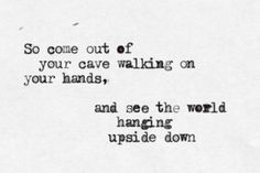 an old black and white photo with the words so come out of your cave walking on your hands, and see the world hanging upside down