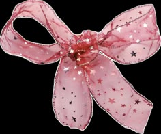 a pink bow with stars on it