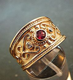 3.85mm .37 Carat AAA Red Rubellite Tourmaline set in 14K Yellow gold diamond ring (.06 carats) This is a stunning AAA grade gemstone that Etruscan Jewelry, Band Diamond Ring, Byzantine Rings, Flush Set Diamond, 45th Anniversary, Jewelry Designing, Rubellite Tourmaline, Attic Storage, Yellow Gold Diamond Ring