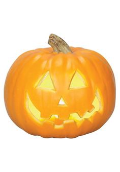 a carved pumpkin with glowing eyes on it's face and mouth, sitting in front of a white background