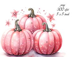 three pink pumpkins sitting on top of each other