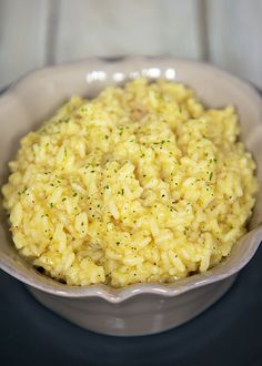 a close up of a bowl of food on a table