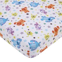 an image of a baby bed sheet with cartoon animals on it's coverlet