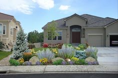 a house with landscaping in front of it