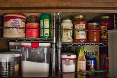 an organized pantry with lots of food and condiments