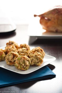 a white plate topped with cookies next to a turkey