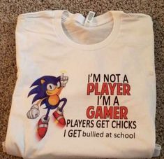 a t - shirt that says i'm not a player, i'm a gamer players get chicks