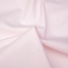 a close up view of a pink fabric