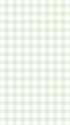 a green and white checkered background with small squares on the bottom right hand corner