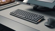 a computer keyboard sitting on top of a desk next to a mouse and eyeglasses