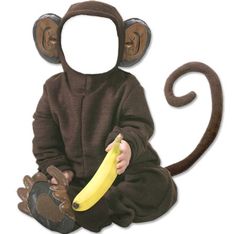 a baby in a monkey costume holding a banana