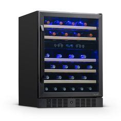 the wine cooler is black and has blue lights