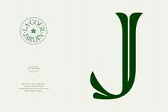 the letter j is made up of green leaves and has a leafy design on it