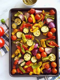 the best ever mediterranean roast veggies are on this sheet pan and ready to be cooked