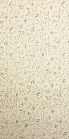 an old fashioned wallpaper with small flowers on it