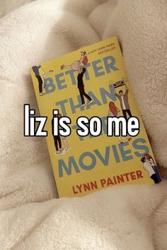 a book that is laying on top of a white blanket with the words, better than liz is so me movies