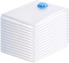 a stack of white paper towels with a blue top