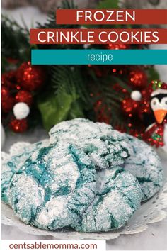 frozen crinkle cookies on a plate with christmas decorations in the background and text overlay that reads, frozen crinkle cookies recipe