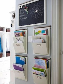 an organized wall with hanging file folders