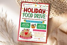 a holiday food drive flyer sitting on top of a table next to a woven basket