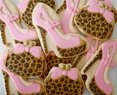 decorated cookies in the shape of leopard print and high heel shoes